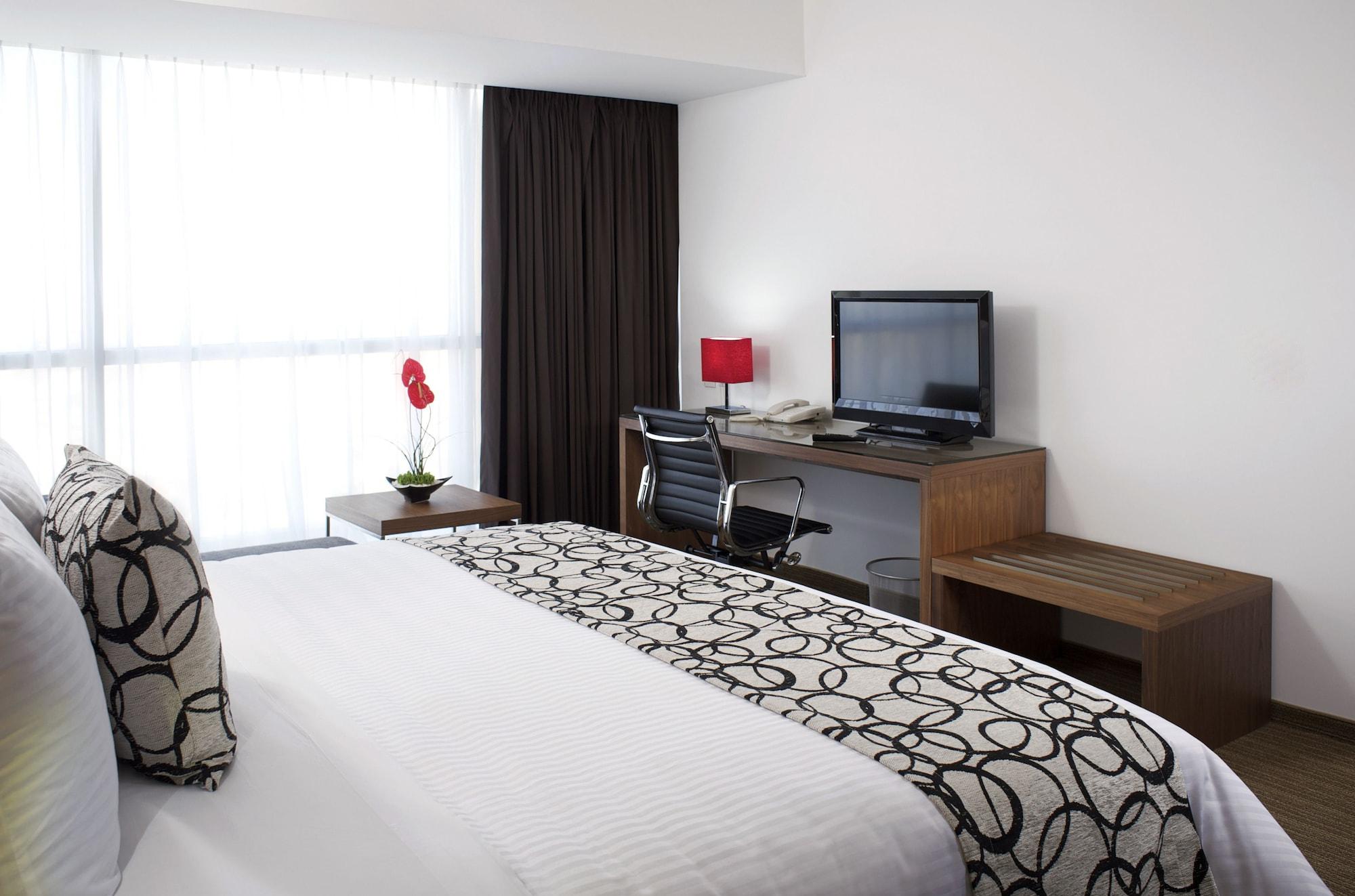Casa Inn Premium Hotel Керетаро Экстерьер фото A bedroom at the hotel