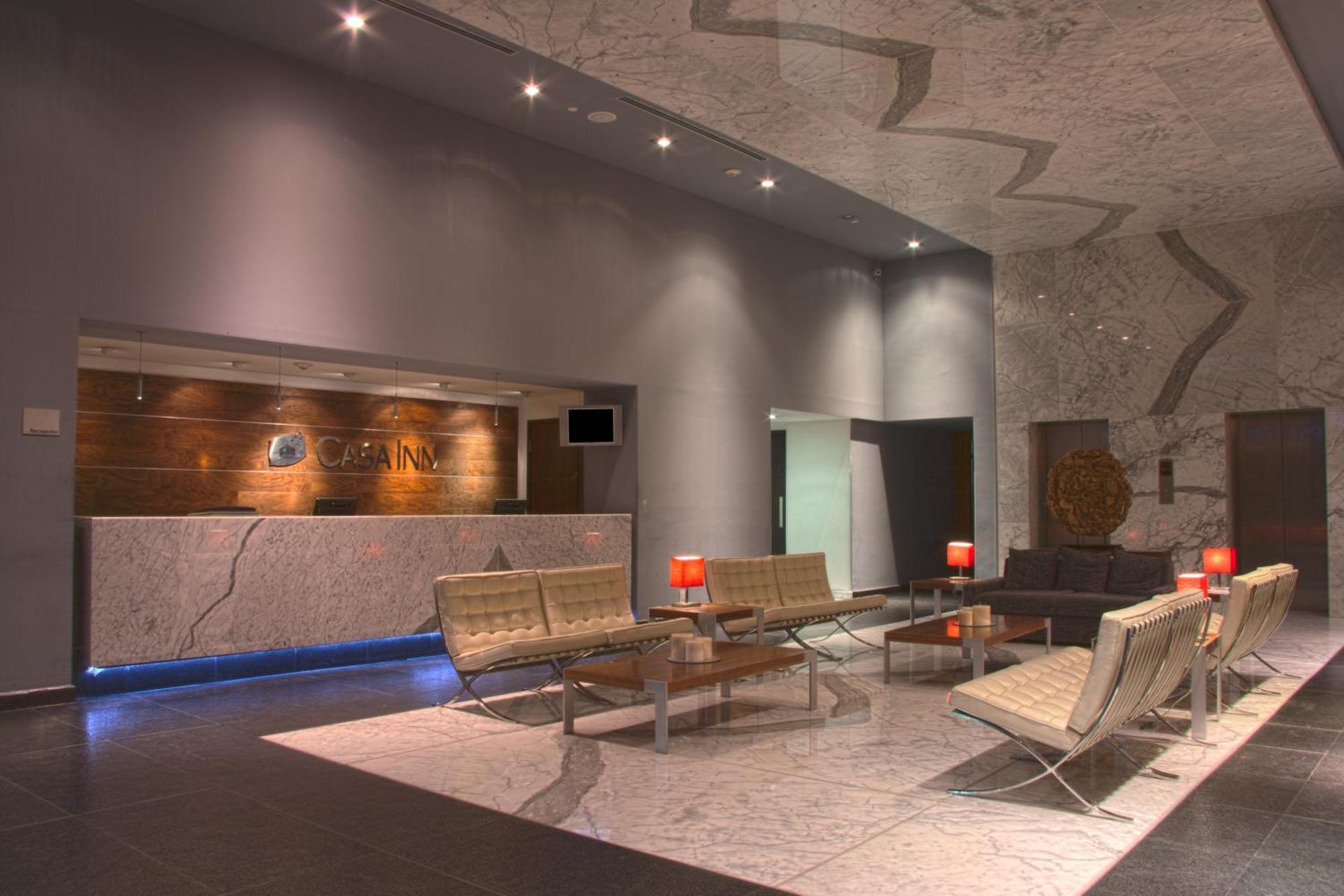 Casa Inn Premium Hotel Керетаро Экстерьер фото The lobby of the hotel