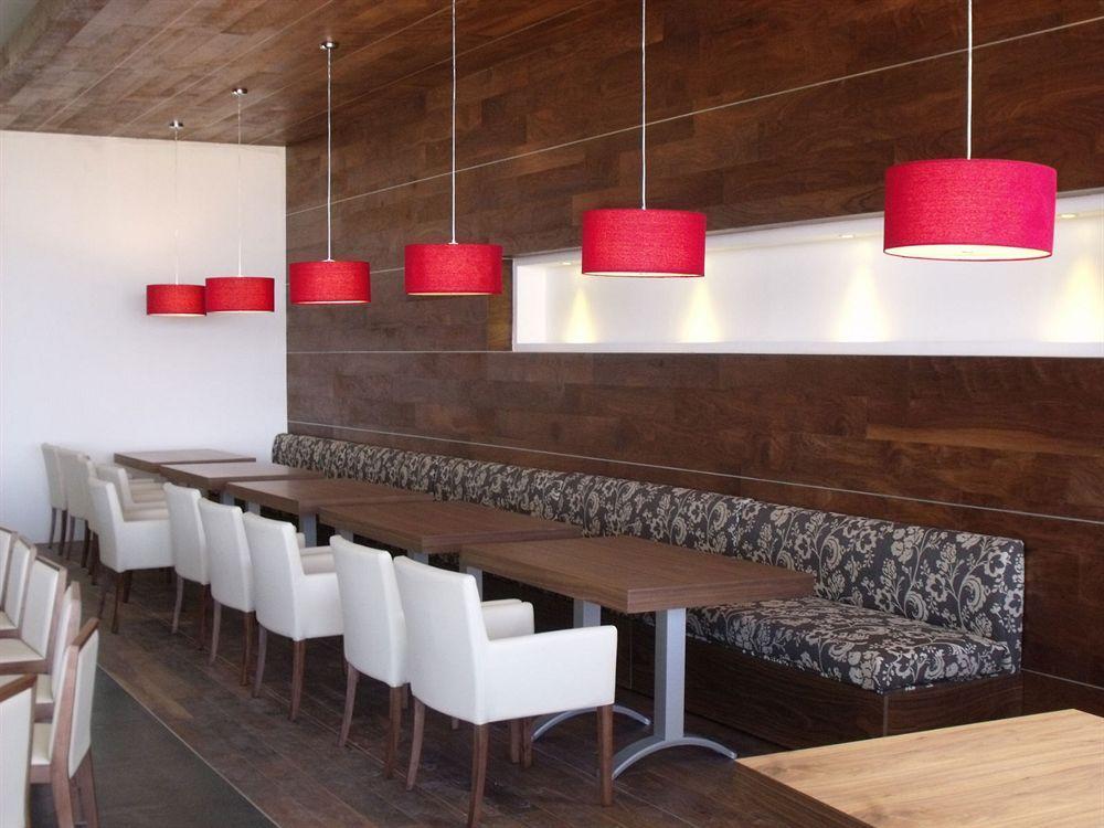 Casa Inn Premium Hotel Керетаро Экстерьер фото Restaurant interior