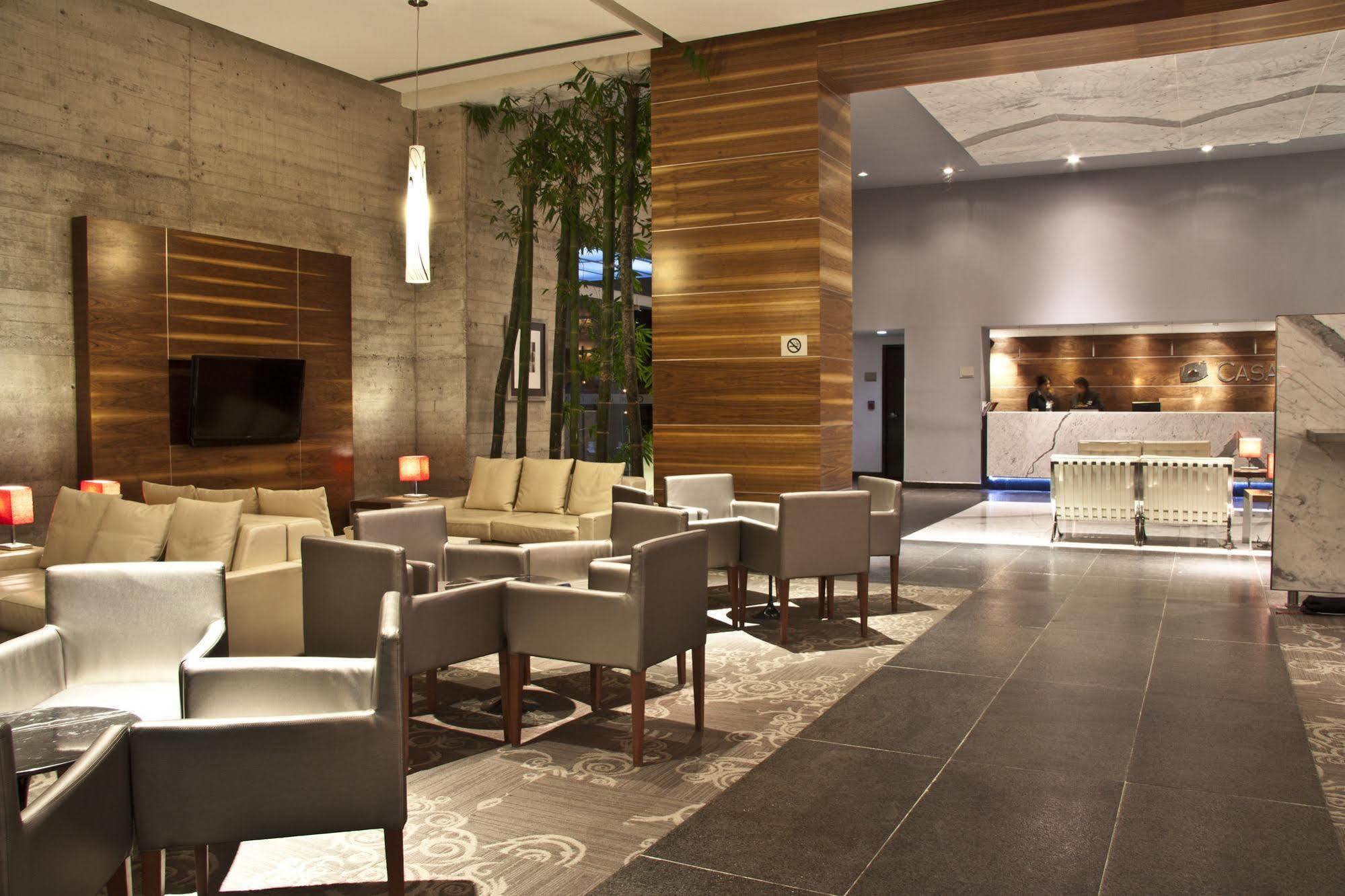 Casa Inn Premium Hotel Керетаро Экстерьер фото The lounge at the airport